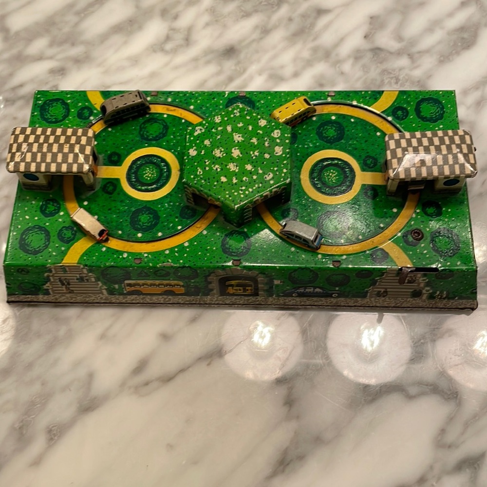 Vintage European car and bus metal toy